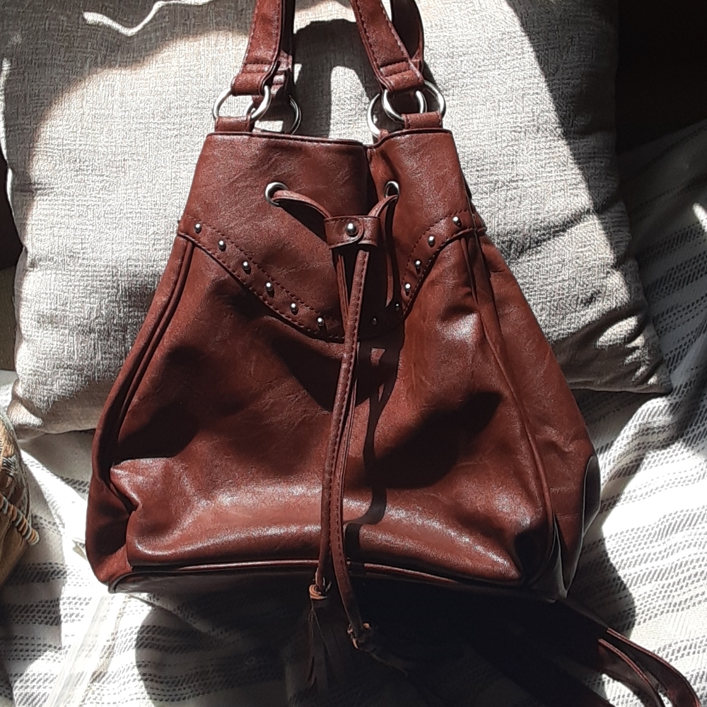 Avon shoulder/ hand/ backpack style bag